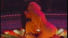 Naked lesbiens licking vagina on the dancefloor