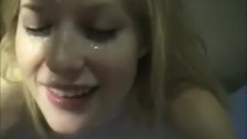 Sexy redhead girlfriend tugs huge cock and takes cum on face